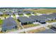 Lovely aerial view of backyard featuring a screened-in patio and a white fence, offering a serene outdoor space at 2005 Noble Dr, Davenport, FL 33837
