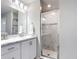 Bathroom featuring a glass door shower and a vanity with stunning countertop at 2005 Noble Dr, Davenport, FL 33837