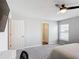 Bedroom featuring a bed, window, ceiling fan, and gray carpeting at 2005 Noble Dr, Davenport, FL 33837