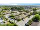 An aerial view shows a community with mature trees, greenery, and well-kept landscaping at 206 Diamond Cv # 106, Casselberry, FL 32707