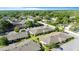 Aerial shot of a community with mature landscaping, ample parking and manicured lawns at 206 Diamond Cv # 106, Casselberry, FL 32707