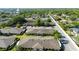 An aerial view of a well-maintained community with mature trees and ample parking at 206 Diamond Cv # 106, Casselberry, FL 32707