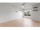 An empty bedroom with a ceiling fan, window, tile flooring and two shelves at 206 Diamond Cv # 106, Casselberry, FL 32707