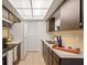 Functional kitchen with ample cabinetry, modern appliances, and well-lit countertops at 206 Diamond Cv # 106, Casselberry, FL 32707