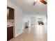 Open floor plan with tile flooring, ceiling fan, and large window offering natural light at 206 Diamond Cv # 106, Casselberry, FL 32707