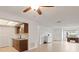 Combined kitchen and living area with tile floors, a ceiling fan and abundant storage at 206 Diamond Cv # 106, Casselberry, FL 32707