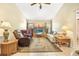 Spacious living room filled with natural light and ample seating at 2106 Altoona Ln, Deltona, FL 32738