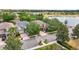 Bird's-eye view of neighborhood showcasing a two-story home with landscaped yard at 2116 Truffle Ln, Casselberry, FL 32707
