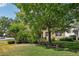 Beautiful home with mature trees and landscaping creates a serene and private backyard at 2116 Truffle Ln, Casselberry, FL 32707