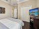 Bedroom featuring a comfortable bed, large closet, and modern ceiling fan at 2116 Truffle Ln, Casselberry, FL 32707