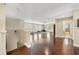 Bright exercise room with wood floors, access to bathroom, and fitness equipment at 2116 Truffle Ln, Casselberry, FL 32707
