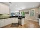 Gourmet kitchen with marble countertops, stainless steel dishwasher, and updated appliances at 2116 Truffle Ln, Casselberry, FL 32707