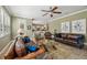 Inviting living room with comfortable seating and open floor plan to kitchen at 2116 Truffle Ln, Casselberry, FL 32707