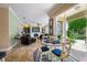 Bright living space adjacent to outdoor area, including fireplace and custom shelving at 2116 Truffle Ln, Casselberry, FL 32707