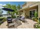 Relaxing backyard patio with stylish outdoor furniture and views of the lake creating a perfect outdoor oasis at 2116 Truffle Ln, Casselberry, FL 32707