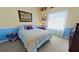 bedroom featuring carpeted floors, light blue accents, and bright natural light at 2232 Lake Vilma Dr, Orlando, FL 32835