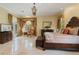 Well-appointed main bedroom featuring refined decor, ample space, and natural lighting at 2232 Lake Vilma Dr, Orlando, FL 32835