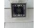 Close up of an electric meter in a clear plastic cover against the exterior of the house at 2260 Winslow Cir, Casselberry, FL 32707