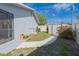 Well-maintained backyard with storage shed and manicured landscaping at 2369 Haulover Blvd, Deltona, FL 32738