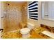 Bathroom with tiled shower, granite countertop, and modern fixtures at 2369 Haulover Blvd, Deltona, FL 32738