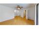 Spacious bedroom featuring neutral tile, closet, and ceiling fan at 2369 Haulover Blvd, Deltona, FL 32738