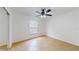 Empty bedroom with a ceiling fan and a large window, offering a blank canvas for personalization and comfort at 2369 Haulover Blvd, Deltona, FL 32738