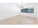 Bright dining room featuring tile floors, white walls and large window at 2369 Haulover Blvd, Deltona, FL 32738