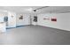 The garage features clean, painted walls, offering a functional space at 2369 Haulover Blvd, Deltona, FL 32738
