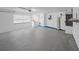 Spacious garage with clean walls and plenty of room for parking and storage at 2369 Haulover Blvd, Deltona, FL 32738