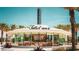 Exterior view of the District Foxtail Coffee Co. building surrounded by palm trees at 2378 Addalia Aly, Orlando, FL 32804