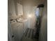 Convenient laundry room with a washer, dryer and storage cabinets at 2711 Neverland Dr, New Smyrna Beach, FL 32168