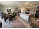 Open-concept living room that seamlessly connects to the kitchen, creating a perfect space at 2711 Neverland Dr, New Smyrna Beach, FL 32168