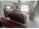Comfortable living room designed for relaxation, featuring plush seating, and a large TV at 2711 Neverland Dr, New Smyrna Beach, FL 32168