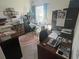 Home office space providing room for focus and productivity, with neutral tones and soft lighting at 2711 Neverland Dr, New Smyrna Beach, FL 32168
