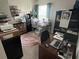 Home office space providing room for focus and productivity, with neutral tones and soft lighting at 2711 Neverland Dr, New Smyrna Beach, FL 32168