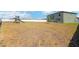 Sprawling backyard with new fence and view of home at 2995 Flying Blackbird Rd, Bartow, FL 33830