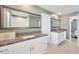 Bright bathroom features dual sinks, granite countertops, and modern fixtures at 2995 Flying Blackbird Rd, Bartow, FL 33830