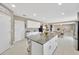 Spacious kitchen showcasing a center island and an open view of the dining area at 2995 Flying Blackbird Rd, Bartow, FL 33830