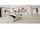 Open-concept kitchen and dining area with a decorative display cabinet at 2995 Flying Blackbird Rd, Bartow, FL 33830