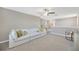 Spacious upstairs living room with comfortable white sofa and lots of room at 2995 Flying Blackbird Rd, Bartow, FL 33830
