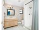 Bathroom with a single sink vanity, toilet, shower with curtain, and tiled floor at 3379 Monika Cir, Orlando, FL 32812