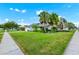 Attractive single-Gathering home featuring lush landscaping and a spacious front yard, providing excellent curb appeal at 3379 Monika Cir, Orlando, FL 32812