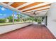The screened patio features a brick floor, a wood ceiling, and a ceiling fan at 3379 Monika Cir, Orlando, FL 32812