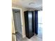 Bathroom with shower, modern black cabinet for storage, and natural light at 37518 Quail Ridge Cir, Leesburg, FL 34788