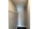 A well-organized closet featuring a sturdy wire shelf for optimal storage solutions at 37518 Quail Ridge Cir, Leesburg, FL 34788