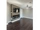 Open-concept living room features a sleek fireplace and modern design at 37518 Quail Ridge Cir, Leesburg, FL 34788