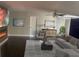 Inviting living room with a cozy fireplace, contemporary furniture, and elegant decor at 37518 Quail Ridge Cir, Leesburg, FL 34788
