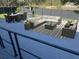 Spacious outdoor deck with comfortable seating, dining area, and grill for entertaining guests at 37518 Quail Ridge Cir, Leesburg, FL 34788
