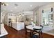 An open-concept kitchen featuring a large island and eating area, flowing seamlessly into the living space at 3883 Grassland Loop, Lake Mary, FL 32746