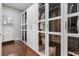 Large walk-in closet with custom shelves and cabinets, with an area for shoe storage at 3883 Grassland Loop, Lake Mary, FL 32746